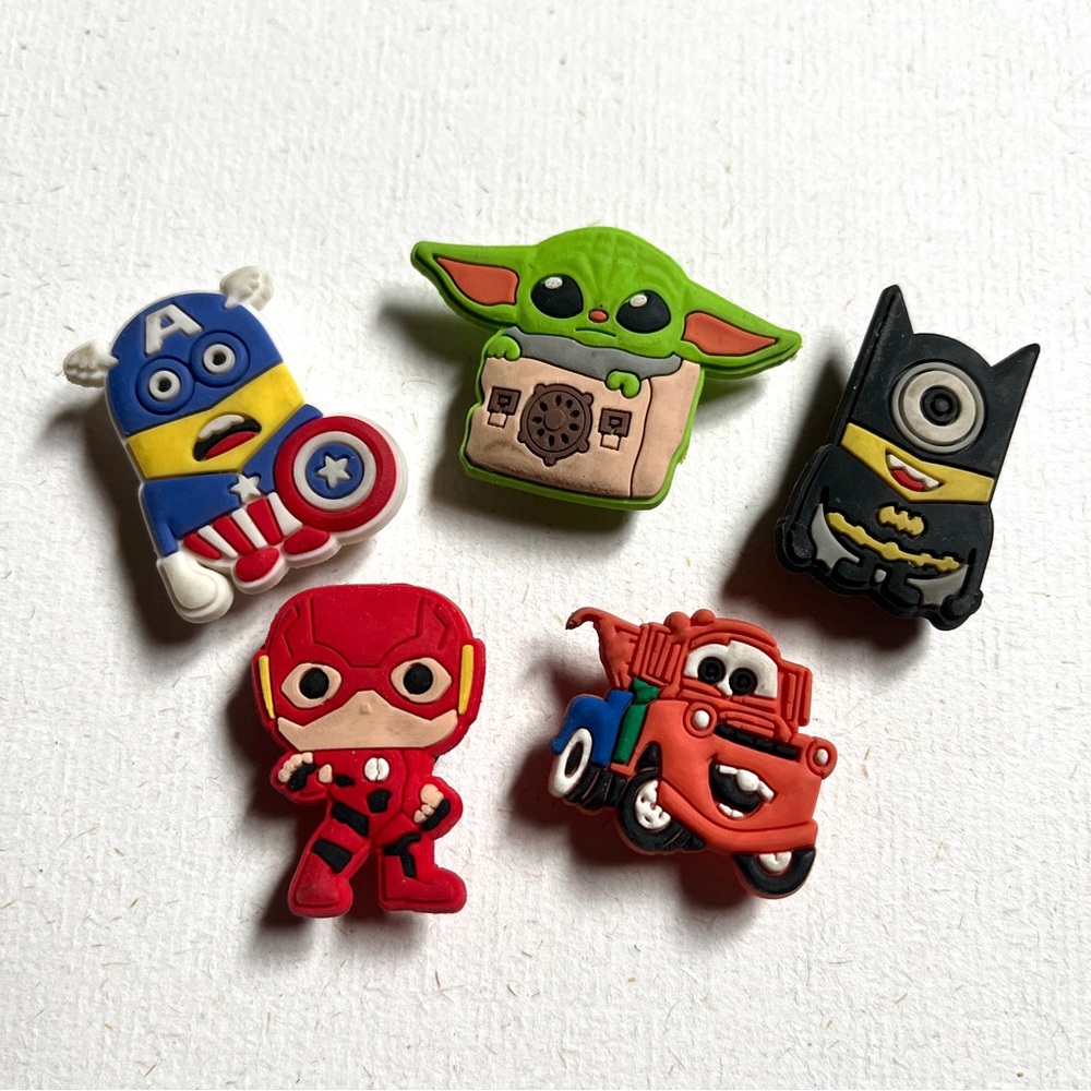 Jibbitz set of 5. Minions Batman & Captain America, Baby Yoda, Cars, & 1 more.